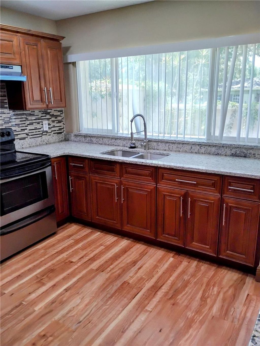 Photo of 11721 Raintree Drive, Tampa, FL 33617 (MLS # TB8407185)