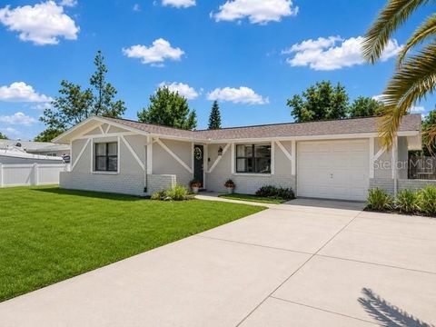 Photo of 9414 Ledgestone Lane, Port Richey, FL 34668 (MLS # W7886711)