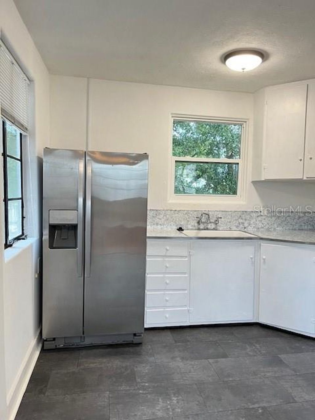 Photo of 330 S Woodland Boulevard #4, Deland, FL 32720 (MLS # V4945329)