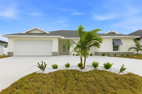 Photo of 1029 NE 13th Place, Cape Coral, FL 33909 (MLS # C7510235)
