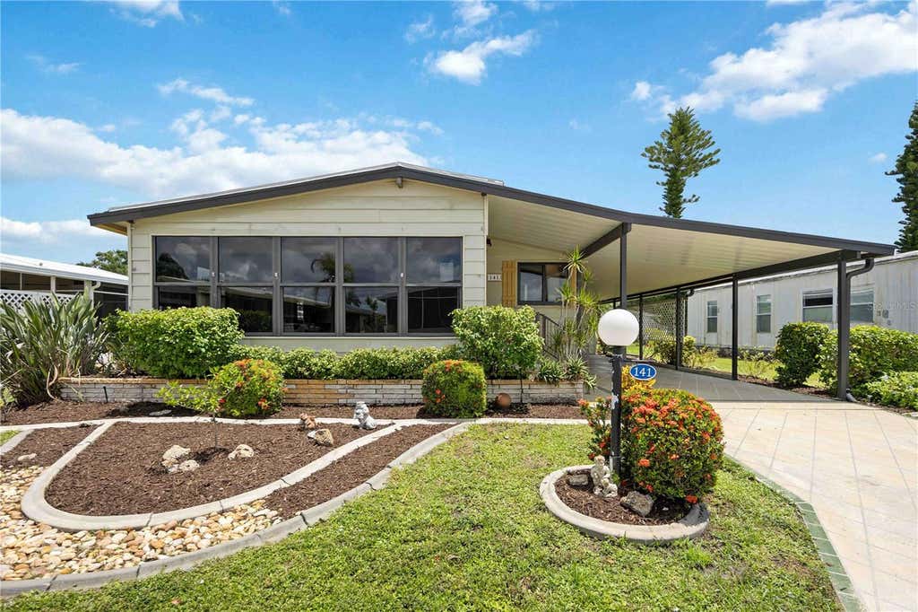 Photo of 141 Rarotonga Road, North Port, FL 34287 (MLS # D6148236)