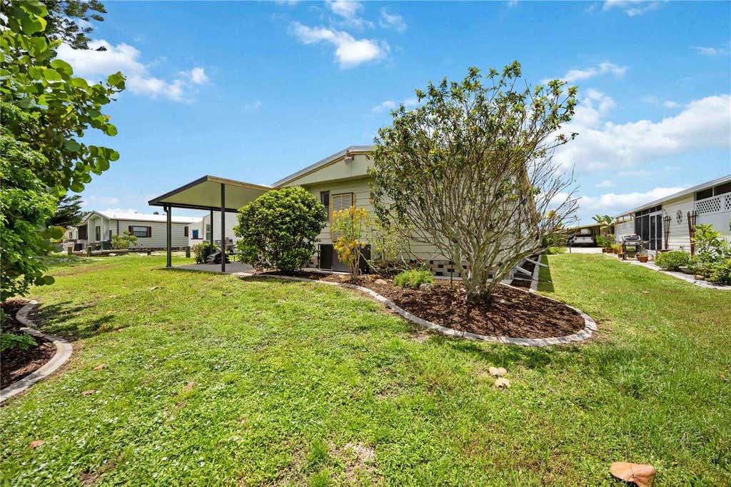 Photo of 141 Rarotonga Road, North Port, FL 34287 (MLS # D6148236)