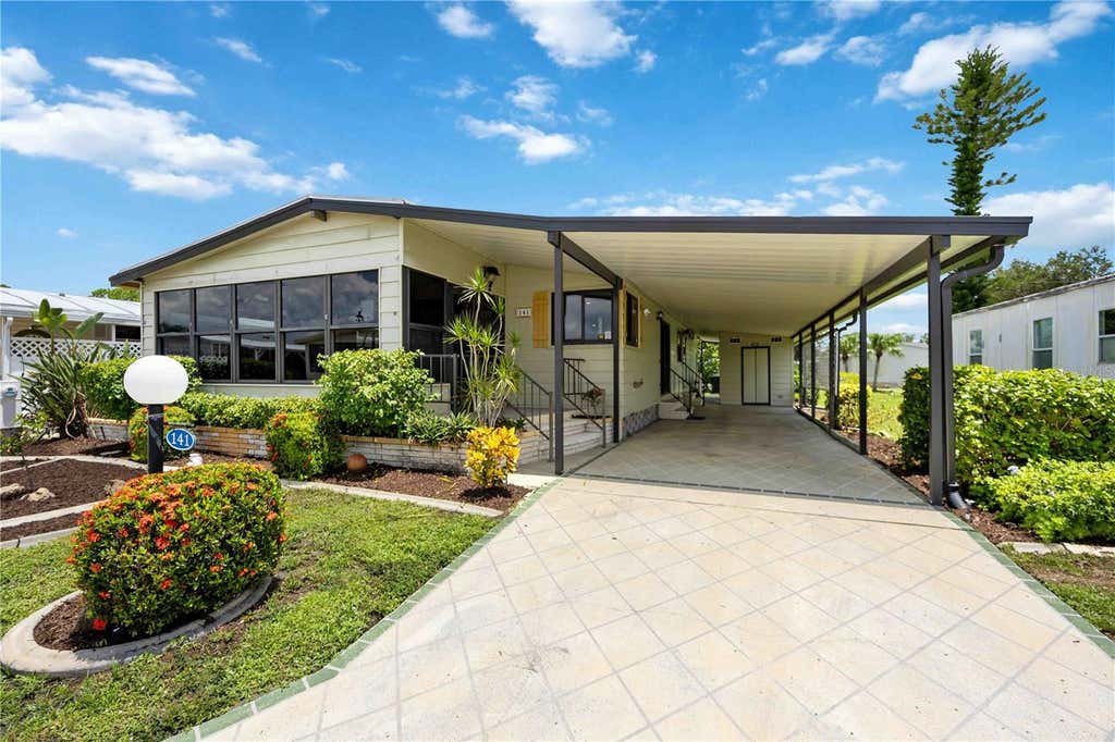 Photo of 141 Rarotonga Road, North Port, FL 34287 (MLS # D6148236)