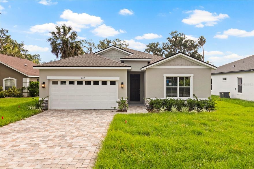 This brand new home in the Arbors of Lake Harris Neighborhood combines modern living with the beauty of nature. Located down the street from a private neightborhood dock on Lake Harris. Enjoy the luxury of launching your boat and taking your friends and family to lunch at one of the many restaurants available on the Chain of Lakes. This 4 bed 3 bath home is fully upgraded with 42' cabinets, Stainless Steel appliances, quartz countertops throughout the kitchen and baths, as well as exquisite Mosaics in the backsplash and Custom Bathrooms. While the split bedroom plan offers privacy, its open concept also gives plenty of room for entertaining guests. Enjoy nature walks, fishing, or the stunning sunrises and sunsets at the Community dock on Lake Harris.