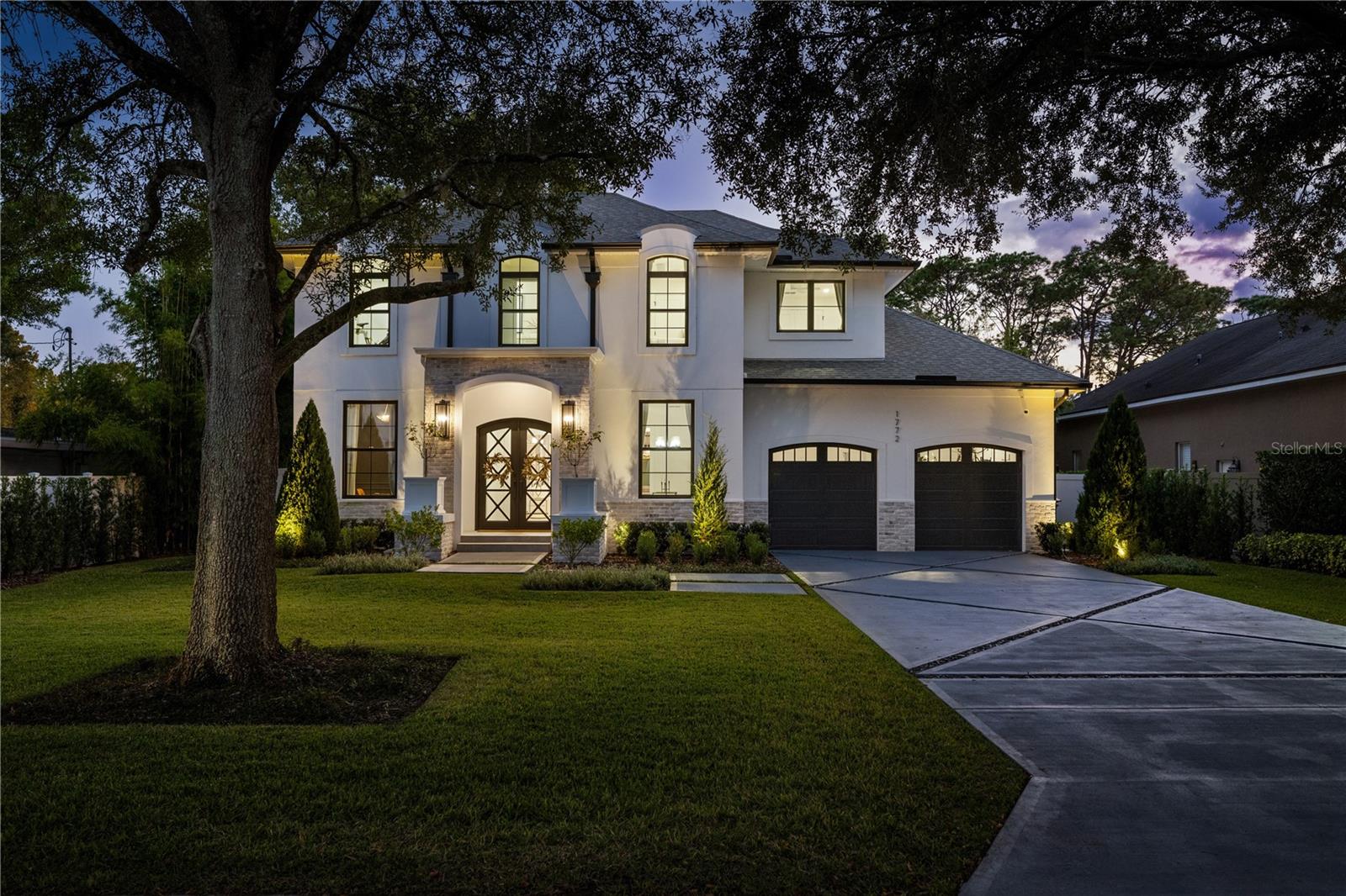 Welcome to 1772 Pine Ave, a calming and elegant residence Built By Vimaro Homes, nestled in the heart of tree streets in Winter Park. Luxury and elegance resonate throughout this exquisite home. From the Restoration Hardware light fixatures to the custom architectural details and top of the line fixtures, no expense was spared in the construction of this stunning home. As you step through the front doors you are immediately greeted by a bright open floor plan that’s perfect for entertaining. The chef’s kitchen includes an oversized center island, quartz countertops, custom cabinetry, a walk-in pantry, and the crown jewel, a La Cornue Range. The primary bedroom suite features a separate sitting area, a spa bath with a walk-in shower and soaking tub, and a massive walk-in closet with built-in custom closet organizers. Exterior amenities include a spacious covered lanai, sparkling pool with a beach area for cooling off in the hot summer sun, and a separate cabana with a summer kitchen, bar area, and a pool bath. For the car enthusiast there is an oversized two car garage with a car lift to accommodate your sports car. Walking distance to Phelps Park and the YMCA and a short golf cart ride to Park Avenues dining and shopping, the location of this remarkable home is truly hard to beat. Don’t miss your opportunity to live the highly sought after Winter Park lifestyle in this amazing one-year-old home.