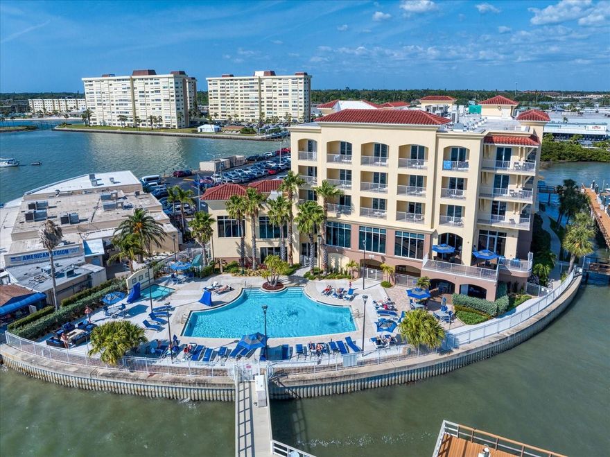 HERE IT IS! YOUR OPPORTUNITY TO HAVE YOUR OWN DEEDED BOAT SLIP WITH A 20,000 LIFT! Harbor Side Boat Club of Madeira Beach is the perfect place to stow your vessel. Slip already has 2 dock boxes ready to store your additional boating equipment. Centrally located, you can walk to restaurants, grocery stores and bait stores are close by as you prepare for your day out on the water with easy access to the Gulf of Mexico through Johns Pass. Harbor Side Marina has 26 boats slips, all deeded and individually owned, gated access and a dock master. Adjacent to the Courtyard Marriott Hotel, with an additional monthly fee you will have access to the hotel facilities which include, fitness center, coin-operated laundry, heated swimming pool and hot tub and discounts on food/drink at the bistro and hotel rooms. Deeded slips with a lift are hard to find in Pinellas County, so don't wait!