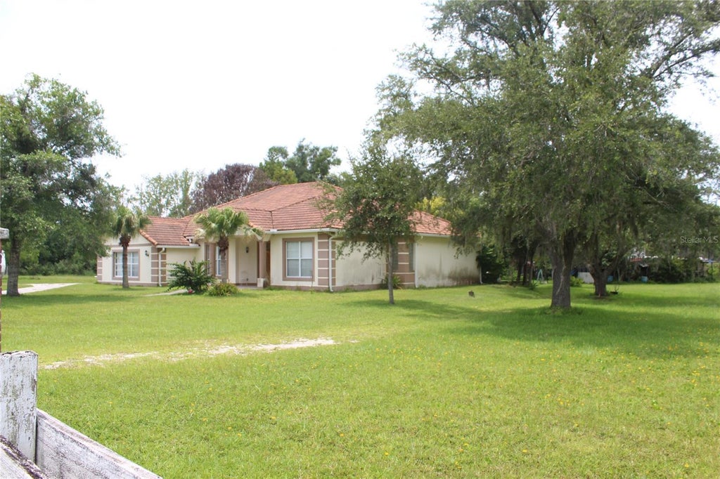 Photo of 4900 S Orange Blossom Trail, Kissimmee, FL 34758 (MLS # O6436123)