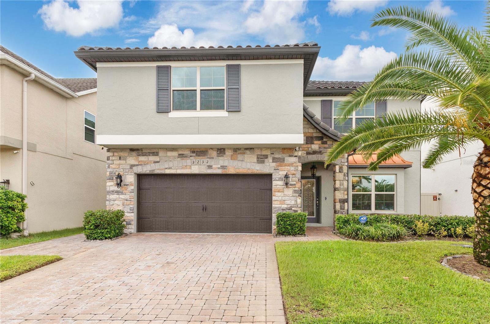 Spanish Style Elegance in the Heart of Lake Nona
Welcome to your dream home in the highly sought-after Lake Nona area—rezoned for A-rated Lake Nona schools! Just minutes from Medical City, the state-of-the-art VA hospital, and all that Lake Nona has to offer, this stunning, energy-efficient home is perfectly positioned for both convenience and lifestyle.
Featuring 5 bedrooms and 4.5 bathrooms, this home combines open-concept living with thoughtfully designed private spaces. Step into the foyer and you’re greeted by a versatile room currently used as a formal living space, but ideal for a home office, den, or flex room.
The gourmet kitchen is the heart of the home, equipped with a gas range, buried propane tank, and whole-house generator—plus granite countertops, 42-inch solid wood cabinetry, an oversized island, and a walk-in pantry. It flows seamlessly into the expansive family room, making entertaining effortless.
Love the outdoors? A 40-foot covered lanai and an impressive full-screen enclosure extend your living space into the backyard—perfect for BBQs, evening cocktails, or weekend gatherings your friends will envy!
The layout includes a convenient downstairs guest suite with a full bath, while upstairs you’ll find a spacious loft ideal for a media room or game space. The primary suite is enormous, with a spa-like bath featuring a garden tub, oversized shower, and a walk-in closet you’ll love. Three additional bedrooms—two connected by a Jack & Jill bath—all boast generous walk-in closets.
Additional highlights include:
Spanish-style tile roof with timeless curb appeal
Whole-house generator for peace of mind
Steps from community pool, trails, and amenities
Energy-efficient design to save on utilities
And here’s the bonus: with the seller’s preferred lender, you may qualify for 100% financing options and even federal grant programs toward closing costs.
Don’t miss this rare opportunity to live in Lake Nona’s most desirable community—schedule your private showing today before it’s gone!