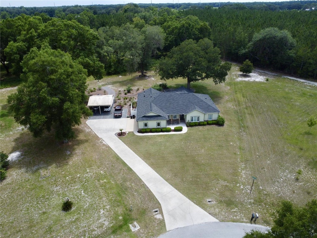 Photo of 18450 NE 61st Lane, Williston, FL 32696 (MLS # GC540980)