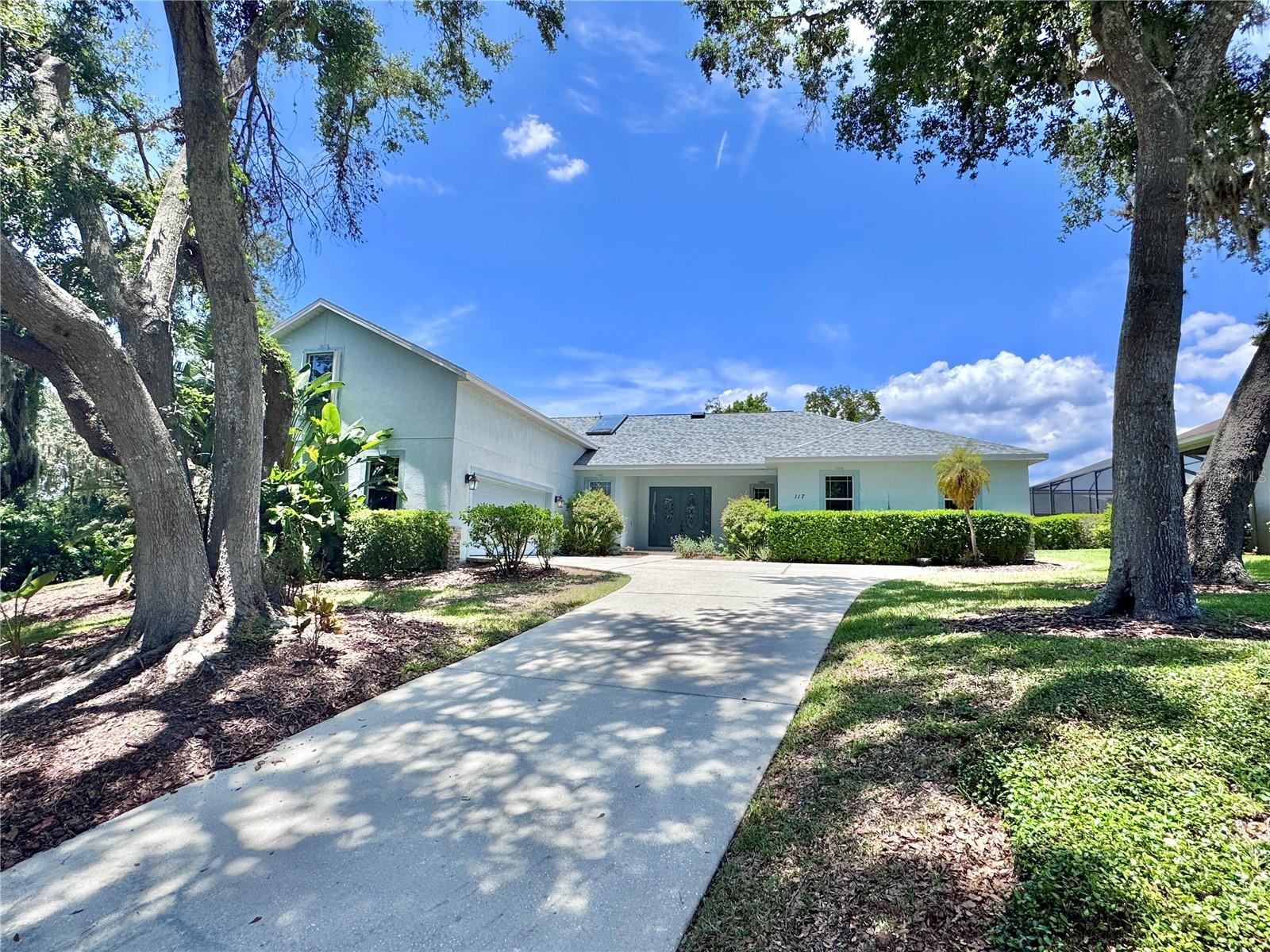 Welcome to your private retreat in the established Camelot Woods community of Brandon! Tucked away at the end of a quiet cul-de-sac, this impressive 4 bedroom, 3 full and 2 half bathroom home offers 3,676 square feet of heated living space on a massive 2.87-acre lot! The roof and AC are both newer from 2022. From the moment you arrive, you’ll be struck by the grand curb appeal, featuring a stately double door entryway that sets the tone for the spacious interior. Inside, a flowing floorplan makes entertaining a breeze. The formal living room boasts a cozy fireplace and generous space, while the formal dining room sits just off the kitchen, perfect for hosting dinner parties. The well appointed kitchen is outfitted with ample cabinet and counter space, new appliances, including a 2025 refrigerator, and a reverse osmosis water system. All bedrooms are generously sized, offering comfort and flexibility. The primary suite is a true retreat, featuring two oversized walk-in closets and a luxurious ensuite bathroom with a garden tub, dual extended vanities, and a walk-in shower. The fourth bedroom, located upstairs with its own private bathroom, is ideal for guests. Step outside to your personal oasis, an expansive pavered lanai, screen-enclosed pool, and plenty of space to enjoy the peaceful natural surroundings. You’ll also enjoy the convenience of close proximity to shopping, dining, and major roadways. Don’t let this rare gem pass you by, schedule a tour today!