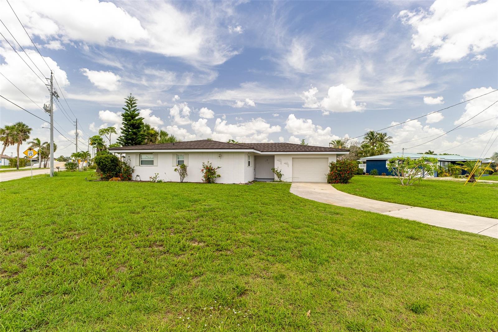 Welcome to paradise! This newly remodeled 3-bedroom, 2-bathroom single-family home in desirable PGI is ready for you to move in and start living the Florida dream. The heart of the home boasts a stunning kitchen with brand new cabinets and gleaming stainless steel appliances. Storage will never be an issue with ample space throughout. The dining room flows seamlessly from the kitchen, perfect for entertaining. Relax and unwind in the large living room, which opens to a spacious Florida room offering serene canal views. The primary bedroom provides direct access to this tranquil space, and the en-suite bath features a brand new vanity, a large master closet, and a luxurious step-down shower. Two additional bedrooms are cozy and comfortable, with plenty of closet space. The second bathroom also features a brand new vanity and a convenient tub/shower combo. Washer and dryer hookups' are readily available. And the location? Unbeatable! Just minutes from Fisherman's Village, the Punta Gorda Farmers Market, and the vibrant History Park vendors market.
