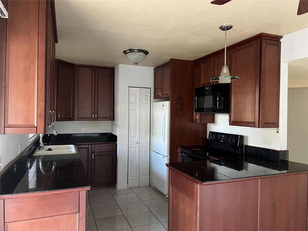 Photo of 5671 Charleston Street, Orlando, FL 32807 (MLS # O6354092)