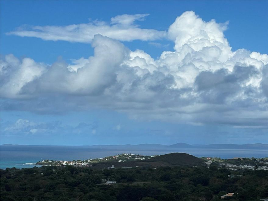 Located in the peaceful hills of Monte Santo, Windhorse Farms Lot 3 offers a rare opportunity to own titled land in one of the most private and scenic areas of Vieques Island, Puerto Rico real. This one-cuerda (just under one acre) parcel is situated in the small, thoughtfully designed Windhorse Farms development—just minutes from both Isabel Segunda and Esperanza. The location offers the perfect balance of privacy and proximity, allowing easy access to beaches, dining, the island’s airport, and the ferry terminal, all while enjoying the tranquility of Caribbean ridge-top living.

The lot gently slopes southward and is ideally positioned to capture sweeping views of the Caribbean Sea, with sightlines toward Culebra and potential east and south-facing ocean views from higher levels of a future build. Its elevated location allows for consistent trade winds and the ability to design a home that fully embraces both landscape and light. Unique natural boulders add character to the land, making it an exceptional setting for custom landscaping or creative architectural elements.

This is a titled property, an important distinction in the Vieques real estate market, making it a strong candidate for buyers planning to build, finance, or hold the property as an investment. A public water line runs to the property boundary and is ready to be metered. Electrical lines are located at the paved road. There is no HOA, giving owners the freedom to design a home that fits their vision, while still enjoying a quiet community of neighbors who value privacy, sustainability, and land stewardship.

Whether you're seeking a future Vieques vacation home, a primary residence, or simply looking to buy land on Vieques with long-term potential, Windhorse Farms Lot 3 presents a compelling mix of natural beauty, access, and infrastructure readiness.

Vieques is known for its wild horses, quiet beaches, and deep connection to nature. As part of Puerto Rico, it offers the benefits of U.S. property ownership, currency, and accessibility—while delivering a lifestyle that feels worlds away. From world-class snorkeling and diving to local farm-to-table cuisine, from sunrise hikes through the Wildlife Refuge to kayaking in the world-famous Bioluminescent Bay (BioBay), life on Vieques offers unforgettable experiences that go far beyond a vacation.

The island’s charm lies in its low density, friendly community, and strong preservation ethic. While other Caribbean destinations have embraced high-density development, Vieques remains a haven for those who value space, nature, and Caribbean lifestyle. Whether you’re drawn to the peaceful beaches of Playa Caracas or Playa Negra, the dining scene in Esperanza, or the local markets in Isabel Segunda, Vieques invites you to slow down and reconnect.

Vieques, PR real estate continues to draw interest from buyers looking for low-key, high-value investment in land. Parcels like Windhorse Farms Lot 3—offering both privacy and accessibility—are becoming increasingly hard to find. This is not a subdivision full of look-alike homes. It’s a small, ridge-top community where each property is unique, and where thoughtful design is welcomed.

Come walk the land, feel the breeze, and see the future you could build here.

Windhorse Farms Lot 3 is one of the best-positioned and most inspiring Vieques properties available today. Contact us to schedule a showing.
