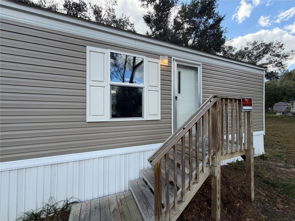 Photo of 9326 SE 143rd Place, Summerfield, FL 34491 (MLS # OM715489)