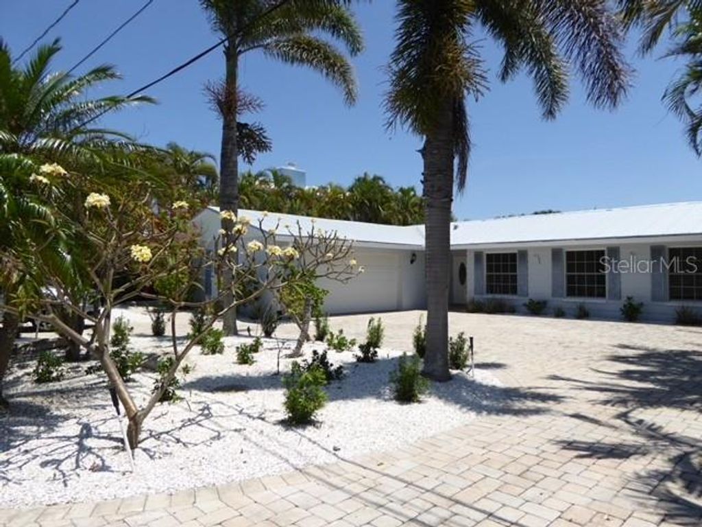 Photo of 12055 4th Street E, Treasure Island, FL 33706 (MLS # TB8514614)