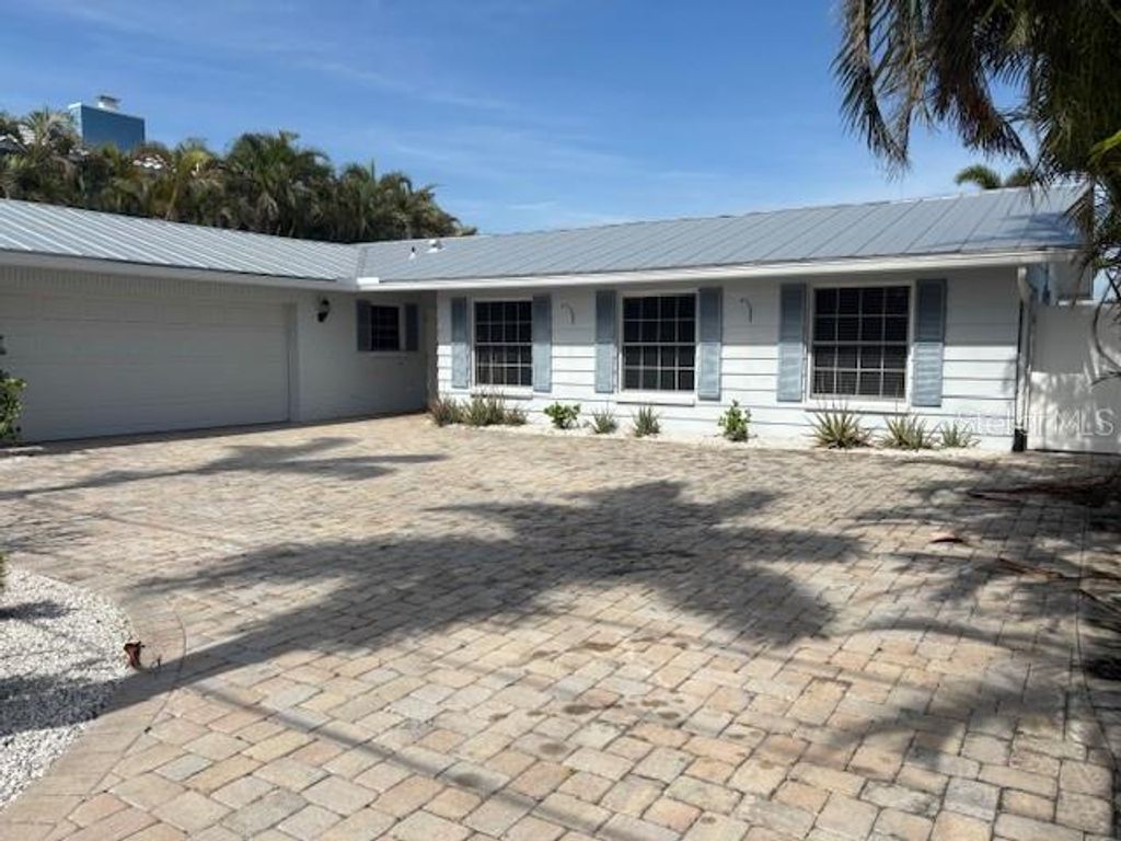 Photo of 12055 4th Street E, Treasure Island, FL 33706 (MLS # TB8514614)