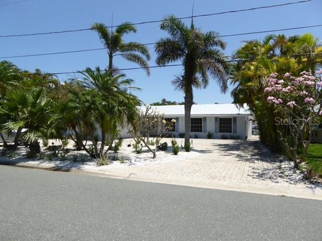 Photo of 12055 4th Street E, Treasure Island, FL 33706 (MLS # TB8514614)