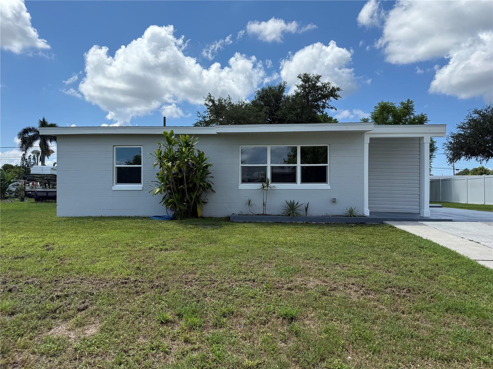 Discover modern comfort in this beautifully remodeled home at 21203 Meehan Ave, Port Charlotte, FL. This stunning residence boasts a brand-new roof (installed 2023), new HVAC system, and new windows, ensuring energy efficiency and peace of mind. Step inside to find a fully upgraded interior, featuring a state-of-the-art kitchen with premium finishes, perfect for culinary enthusiasts. Every detail has been thoughtfully redesigned, offering a fresh, contemporary feel throughout. Located in the heart of Port Charlotte, this move-in-ready gem combines style, functionality, and recent upgrades for worry-free living. Don’t miss your chance to own this meticulously updated home!