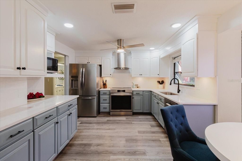 Photo of 715 Rolling Hills Drive, Palm Harbor, FL 34683 (MLS # TB8499257)