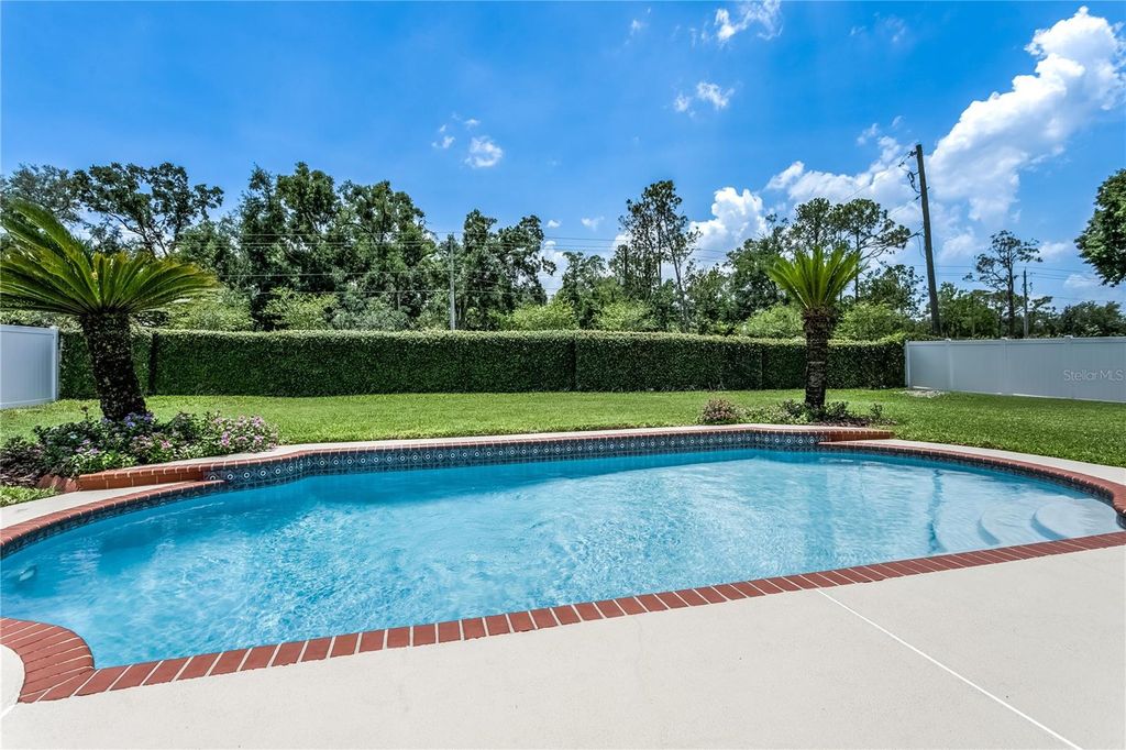 Photo of 9203 Kingsridge Drive, Temple Terrace, FL 33637 (MLS # TB8495544)