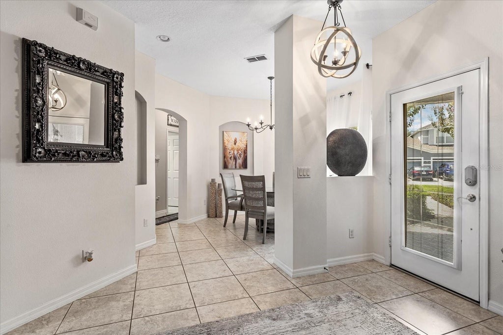 Photo of 1506 Travertine Terrace, Sanford, FL 32771 (MLS # O6441569)