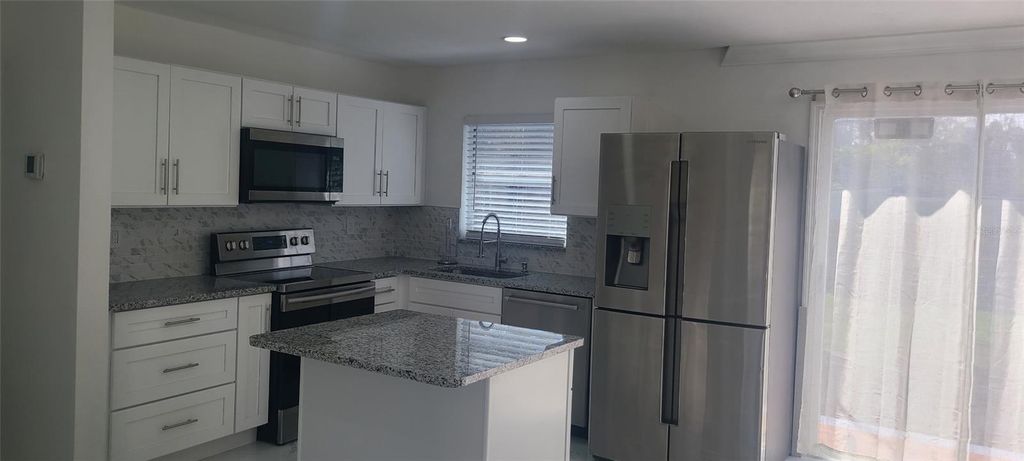 Photo of 1325 Mary L Road, Clearwater, FL 33755 (MLS # TB8484794)