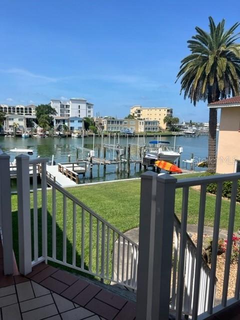 WATERFRONT AVAILABLE AUGUST 2026 and forward * $2100 off-season/SEASONAL rate Jan-April $3200*ENJOY PARADISE* FULLY EQUIPPED UNIT. Rate includes; water,trash,cable, internet, shared laundry room (seasonal rate>electric up to $100)*FULLY TURNKEY* only need your personal items. This unit is a CHARMING FULLY FURNISHED 2 BEDROOM 2 BATH 2nd FLOOR WATERFRONT UNIT-WITH WATER VIEWS FROM THE ENCLOSED PATIO and Living Room. UPDATED AND FULLY EQUIPPED FOR YOUR VACATION NEEDS.LAUNDRY FACILITY RIGHT OUTSIDE YOUR DOOR AND NO CHARGE FOR IT! PLENTY OF FINE AND CASUAL RESTAURANTS, NIGHTLIFE, SHOPPING,AND ACTIVITIES SUCH AS; CHARTER BOAT FISHING,DINNER CRUISES,SIGHTSEEING TOURS,SEGWAY, DOLPHIN SPOTTING TOURS,PIRATE SHIP..AND ON LAND ENJOY; DAILY SUNSETS AT PIER 60 W/ARTISANS, CRAFTERS,STREET PERFORMERS AND MUSICAL ENTERTAINMENT ALONG WITH MOVIES ON THE LAWN AT NIGHT ---COME HAVE FUN AND RELAX YOU DESERVE IT! RATES VARY by PEAK & OFF PEAK SEASON-CALL AGENT- Florida Law requires 13% tax for under 6 months-- COME AND ENJOY!! SORRY NO PETS