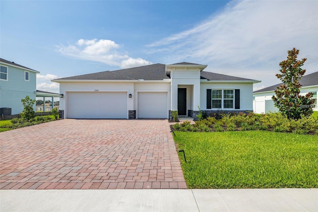 Photo of 11182 Nellie Crossing Circle, Clermont, FL 34711 (MLS # O6451223)