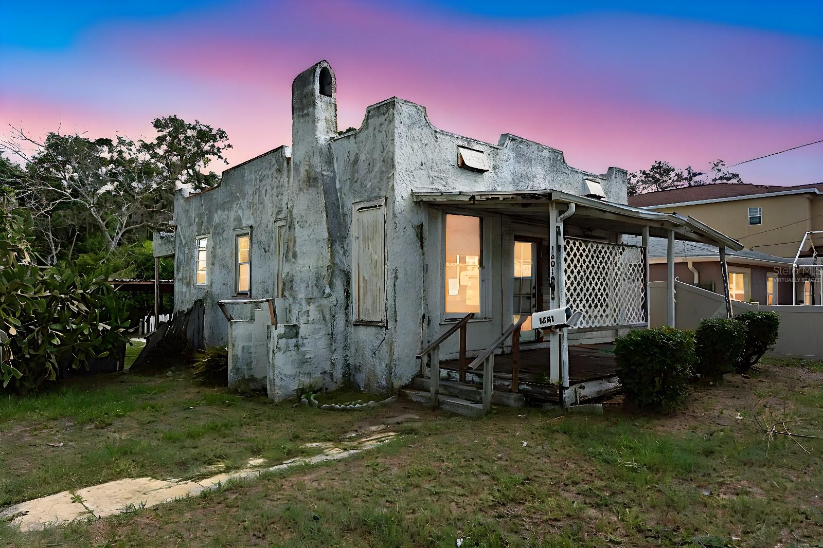 One or more photo(s) has been virtually staged. INCREDIBLE REDEVELOPMENT OPPORTUNITY just outside Tarpon Springs city limits! Located on a spacious corner lot with a fenced yard, this property offers endless possibilities. The charming 98-year-old frame home features a cozy fireplace, well, shed, and 2-car carport. Whether you choose to restore the original home to its former glory or build your dream home in this established neighborhood, the choice is yours—home may or may not be salvageable, buyer to verify. Enjoy being just minutes away from the world-famous Tarpon Springs Sponge Docks on the Anclote River and less than 6 miles from Fred Howard Park and Sunset Beach! Listed for land value only—opportunities like this don’t come around often. Perfect location, unbeatable price—act fast before it’s gone!**