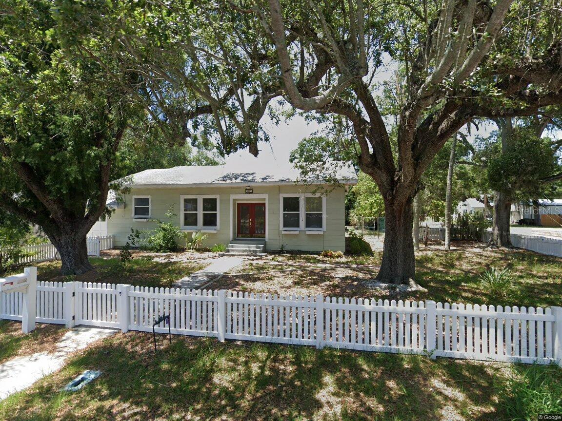 Step into a piece of Old Florida with this beautifully preserved 1925-built home, brimming with character and charm. Located on a spacious corner lot in desirable West Bradenton, this 3-bedroom, 2-bathroom residence offers over 1,900 square feet of inviting living space.
You’ll fall in love with the recently refinished hardwood floors, freshly painted original plaster walls, and soaring 9.5-foot ceilings that evoke a classic elegance throughout. Modern updates blend seamlessly with vintage appeal, including new appliances and a thoughtfully converted garage—now serving as a versatile utility room with extra space ideal for a home office or workshop.
The expansive lot provides ample room to add a pool, guest house, or lush garden oasis. Just minutes from SRQ Airport and the stunning beaches of Anna Maria Island, this location offers the best of both convenience and coastal living. Enjoy easy access to top-rated schools, shopping, dining, recreation, and entertainment.
Don’t miss your chance to own a unique slice of Florida history—where timeless design meets everyday comfort.
Professional Photos coming soon!