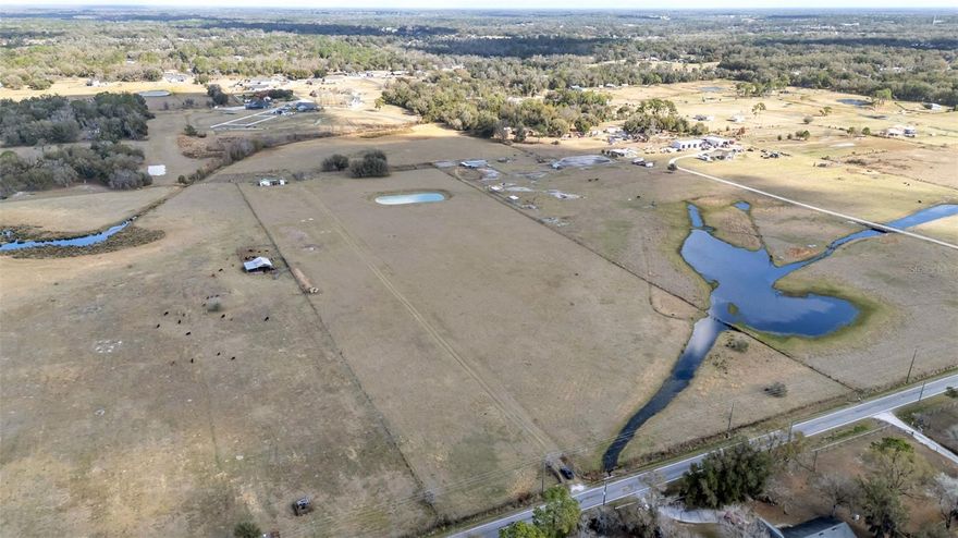 Rare opportunity to own 25.68 acres of fully fenced pasture land in Lakeland, located just east of the 34.51-acre parcel on Bella Vista. This parcel offers endless possibilities for agriculture, ranching, livestock, or investment.

The property is fully fenced and features a small concrete shed at the rear of the land, currently used as a shelter for a generator. Utilities are accessible nearby, and the parcel offers excellent road frontage for easy access.

Don’t miss this rare Polk County offering – a great canvas for farming, homesteading, or future investment!