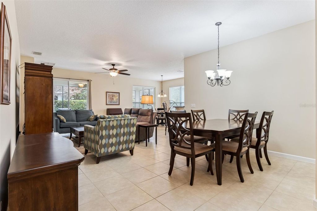 Photo of 1375 Hazeldene Mnr, Deland, FL 32724 (MLS # O6384604)
