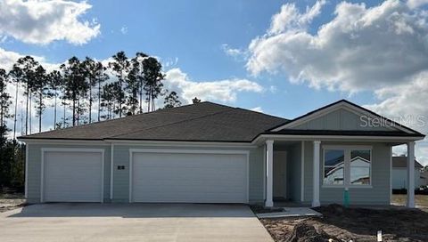 Photo of 75 Sawdust Lane, Palm Coast, FL 32137 (MLS # FC314639)