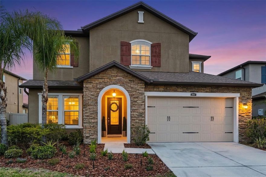 Welcome to the beautiful Regent floor plan by WCI, built in 2017 and offering just under 2,900 heated square feet of thoughtfully designed living space. This stunning home features four spacious bedrooms, a large loft, and a private office, all tucked inside the highly sought after community of Estancia at Wiregrass Ranch in the gated village of Cortona.
As you enter Cortona and make your way to the home, you are immediately welcomed by the beautiful upgraded elevation with eye catching stonework, fresh landscaping, and lush green grass that add to the home’s exceptional curb appeal. Situated on a premium pond lot, this property offers peaceful backyard views that can be enjoyed from the comfort of your fully screened lanai.
Inside, the home showcases beautiful wood-look porcelain tile throughout the main living spaces, creating both style and durability. Just off the entry, you are greeted by a massive private office with French doors and a large storage closet, perfect for working from home or creating a quiet retreat. As you continue through the home, you will find a stunning kitchen featuring beautiful 42' cabinetry, quartz countertops, stainless steel appliances, and an ideal layout for everyday living and entertaining. The spacious great room flows effortlessly into the kitchen and dining area while offering beautiful views of the backyard.
The primary suite is conveniently located downstairs and features an oversized en suite bathroom and a spacious walk in closet. Upstairs, the beautiful hand carved luxury vinyl plank flooring continues up the staircase and into the oversized loft, creating a warm and upscale feel. You will also find three additional spacious bedrooms, two full bathrooms, and brand new carpet in the secondary bedrooms.
Freshly painted both downstairs and upstairs, this move in ready home has also passed a recent four point home inspection for added peace of mind. 
Estancia at Wiregrass Ranch is known for its resort-style amenities, including a stunning clubhouse, pool, fitness center, tennis, pickleball and basketball courts, dog parks, and miles of scenic walking trails. All of this is conveniently located near top-rated Wiregrass schools, shopping, dining, and everyday conveniences. This home is truly move-in ready and showcases the perfect balance of luxury, functionality, and location. With a wonderful location, top rated school zones, and a community everyone wants to be part of, this is an incredible opportunity to own in one of Wesley Chapel’s most desirable neighborhoods! Schedule your private showing and experience it for yourself. **ASK ABOUT OUR PREFERRED LENDER INCENTIVES & OUR OTHER PROMOS!**