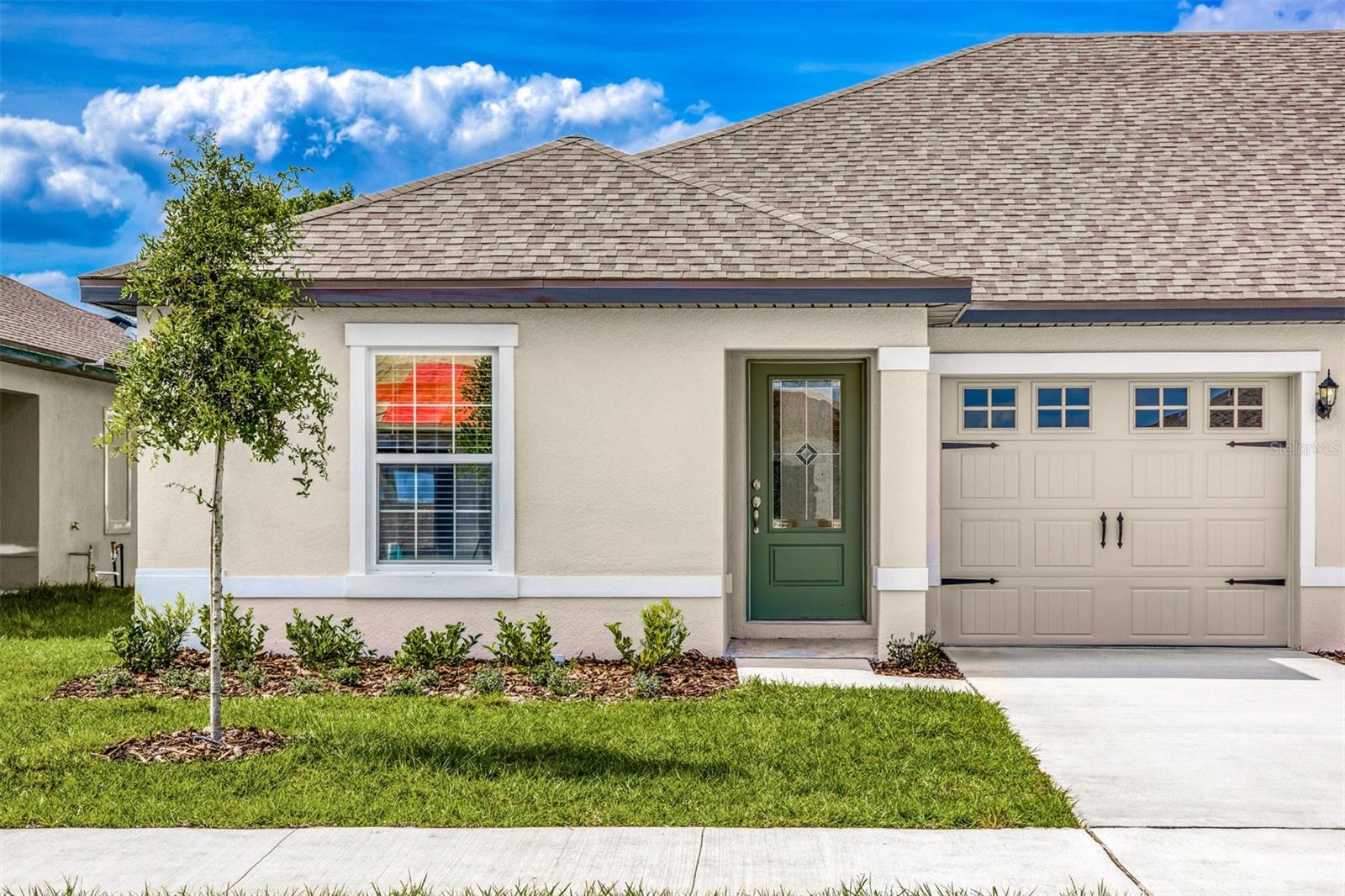 Reduced Price! Stylish and Low-Maintenance Ibis Home in Gum Lake Preserve
Discover the perfect blend of comfort, efficiency, and value with the Ibis floor plan, now available at a reduced price in the highly sought-after Gum Lake Preserve community. This charming 2-bedroom, 2-bathroom one-story home is designed for easy living, modern convenience, and low-maintenance style, ideal for first-time buyers, downsizers, or anyone looking for a peaceful place to call home.
Step onto the covered front porch and into a bright, open layout that features a spacious living and dining area with seamless flow into the well-equipped kitchen. The kitchen offers granite countertops, white wood cabinets, energy-efficient Whirlpool stainless steel appliances, and a breakfast bar—a great spot for casual meals and conversation.
The primary bedroom, located at the rear of the home for added privacy, features soft carpet flooring, a large walk-in closet, and a private en-suite bath. A second bedroom and full bath provide flexibility for guests, a home office, or a hobby room. Luxury vinyl flooring runs throughout the main living spaces for durability and style.
Additional features include double-pane insulated low-E windows, a programmable thermostat, and blinds on all front-facing windows. Enjoy outdoor relaxation in your backyard space and take pride in the professionally landscaped front yard.
Located in the scenic and serene Gum Lake Preserve, this home is part of a vibrant lakeside community with access to a community boat ramp, a planned fishing dock, nature trails, pondside picnic areas, and a playground for family fun. With its proximity to I-4, getting to Tampa, Orlando, or nearby attractions is quick and convenient.
Don’t miss out on this reduced pricing opportunity, schedule your private tour of the Ibis today and make lakeside living your reality!