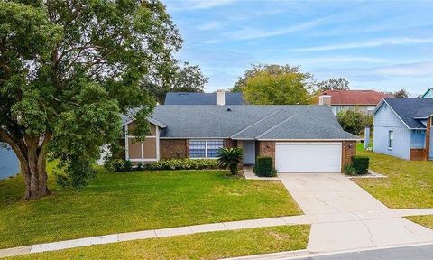 Photo of 6758 Limpkin Drive, Orlando, FL 32810 (MLS # O6391520)