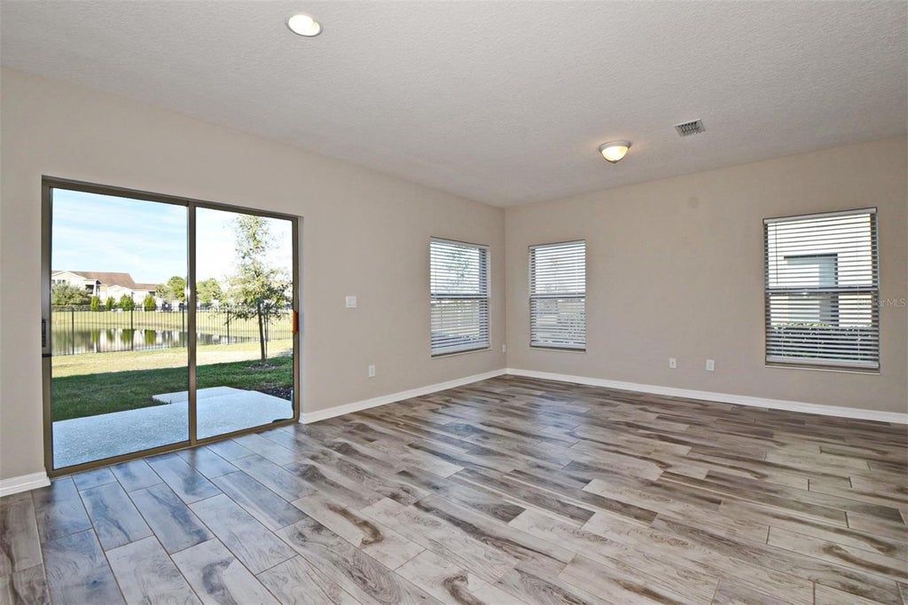 Photo of 12163 Water Poppy Court, Orlando, FL 32828 (MLS # O6417988)