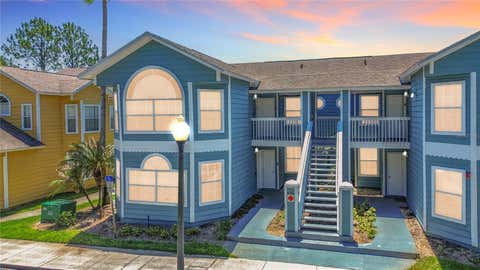 Photo of 8716 Rain Forest Place #A, Kissimmee, FL 34747 (MLS # V4949045)