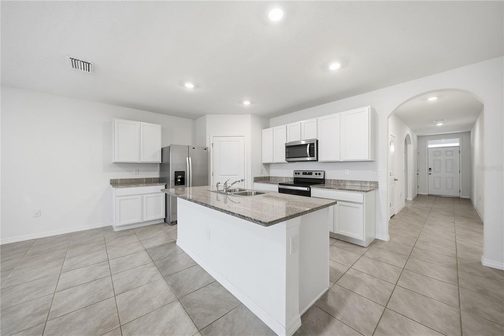 Photo of 32597 Kobuk Valley Avenue, Wesley Chapel, FL 33543 (MLS # TB8467241)