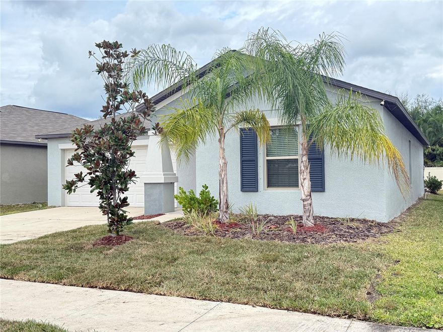 Welcome to the pristine Leisey Community in Apollo Beach. This well-maintained, LIKE NEW (2022), single-family home features 3 bedrooms, 2 bathrooms, and a 2-car garage on a premium lot. Priced competitively within the community, this immaculate home offers ample space for entertaining family and friends. LOW HOA and NO FLOOD ZONE. Residents of Lynwood enjoy resort-style amenities, including a sparkling community pool, playgrounds, walking trails, and beautifully maintained common areas that promote relaxation, recreation, and connection. This neighborhood provides more than just a place to live; it offers a vibrant lifestyle. As you enter the home, the light and bright foyer and hallway lead to two bedrooms and a bathroom on your right. Just ahead, you'll find the spacious family room, open kitchen, and master suite. The kitchen is a highlight, featuring granite countertops, stainless steel appliances—including a gas range—a large island or breakfast bar, a huge walk-in pantry, and a tankless water heater. It seamlessly opens to a generously sized family room with tile flooring throughout and high ceilings. The split floor plan ensures comfort and privacy for all household members. Enjoy countless evenings entertaining guests in the fully fenced backyard. The spacious laundry room features a washer and dryer for added convenience. Fresh sod will be installed on Monday. Conveniently located near top-rated schools, shopping centers, dining options, and two international airports—just a short 20-30 minute drive—this home offers exceptional comfort and convenience. Every aspect of this property is designed for the modern family that values quality, efficiency, and community. Please make your appointment today. This home is available for a quick closing, and the seller is willing to assist with closing costs upon acceptance of an offer. Some pictures were virtually staged.