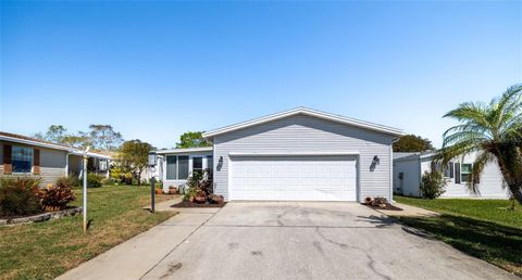 Photo of 709 Helmsmen Lane, Edgewater, FL 32141 (MLS # NS1084258)