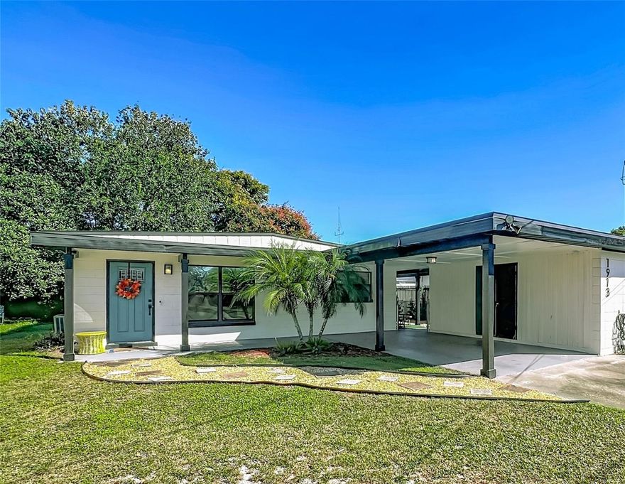 Welcome to 1913 Larkin Ave- a beautifully updated 3Bd/2Ba home quietly situated on a dead end street with-in the Valencia Park neighborhood.  This nicely maintained home offers an inviting feel with its spacious, well designed layout and soaring ceilings. Large windows fill the foyer and living room with natural sunlight, creating a warm and comfortable atmosphere. The kitchen is large with an eat in dining area with added storage and plenty of cabinets with a bar area as well for quick snacks or full sit down meals.  The primary bedroom has its own en-suite full bathroom and walk in closet, which is  a rare find for this mid century ranch home.  Enjoy the extra storage and detached laundry room, a carport, and a large Fenced Backyard with a covered seating area perfect for pets, BBQ's and a quiet shaded space for play or to unwind. offering peace and privacy while still just minutes from downtown Orlando (3 miles), Orlando International Airport (MCO) (6 miles) major highways(408) and shopping walking distance away. Zoned for top-rated schools- Boone High School and with NO HOA, this Gem is ideal for Families or Investors! Recent upgrades include a NEW ROOF (2021), UPDATED PLUMBING (2021), Freshly painted inside and out (2023) Newer Stainless-Steel Appliances, Granite counter tops (2021) Septic Serviced (2022).  Must See to appreciate this relaxing and easy to maintain home