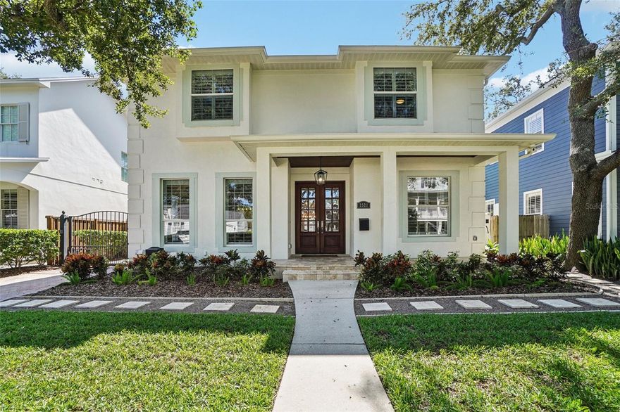Welcome to this lovely POOL home in New Suburb Beautiful, one of the most coveted neighborhoods in all of South Tampa, known for picturesque tree lined streets, top schools, convenient location, and a HIGH AND DRY elevation giving you stress free living where no flood insurance is required. From the welcoming front porch you will step through the front door onto brand new wide plank white oak flooring installed throughout the entire home. As you enter the home the living area and dining room are on your left. Towards the back of the home is the beautifully updated kitchen with a Thermador 6 burner gas range, all stainless-steel appliances, a microwave drawer, a wine fridge, and an eat-in kitchen nook.  The kitchen is open to the expansive family room with gas fireplace and French doors leading to the screened in lanai all overlooking the heated pool with light colored travertine pavers. The detached 2 car garage is accessed through the privately GATED driveway with front and rear doors for easy and convenient drive through ally access.  The first floor also features a bedroom which would make a perfect guest suite/den/office along with a full bath.  Upstairs are 4 more spacious bedrooms, a guest bathroom, laundry, and the owner’s suite with a vaulted ceiling, walk-in-closet, a timeless black and white tiled bathroom with double sinks, a jacuzzi tub and a separate walk-in shower. You must see this perfectly maintained home in this gorgeous neighborhood!