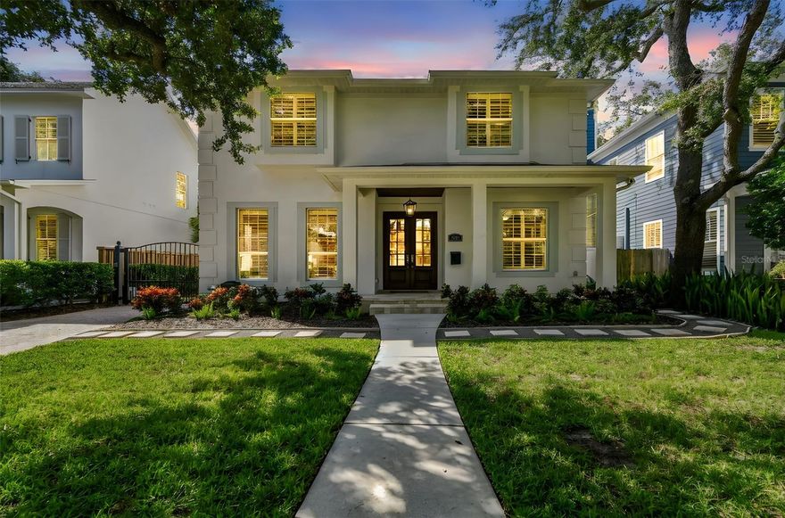 Welcome to this lovely POOL home in New Suburb Beautiful, one of the most coveted neighborhoods in all of South Tampa, known for picturesque tree lined streets, top schools, convenient location, and a HIGH AND DRY elevation giving you stress free living where no flood insurance is required. From the welcoming front porch you will step through the front door onto brand new wide plank white oak flooring installed throughout the entire home. As you enter the home the living area and dining room are on your left. Towards the back of the home is the beautifully updated kitchen with a Thermador 6 burner gas range, all stainless-steel appliances, a microwave drawer, a wine fridge, and an eat-in kitchen nook.  The kitchen is open to the expansive family room with gas fireplace and French doors leading to the screened in lanai all overlooking the heated pool with light colored travertine pavers. The detached 2 car garage is accessed through the privately GATED driveway with front and rear doors for easy and convenient drive through ally access.  The first floor also features a bedroom which would make a perfect guest suite/den/office along with a full bath.  Upstairs are 4 more spacious bedrooms, a guest bathroom, laundry, and the owner’s suite with a vaulted ceiling, walk-in-closet, a timeless black and white tiled bathroom with double sinks, a jacuzzi tub and a separate walk-in shower. You must see this perfectly maintained home in this gorgeous neighborhood!