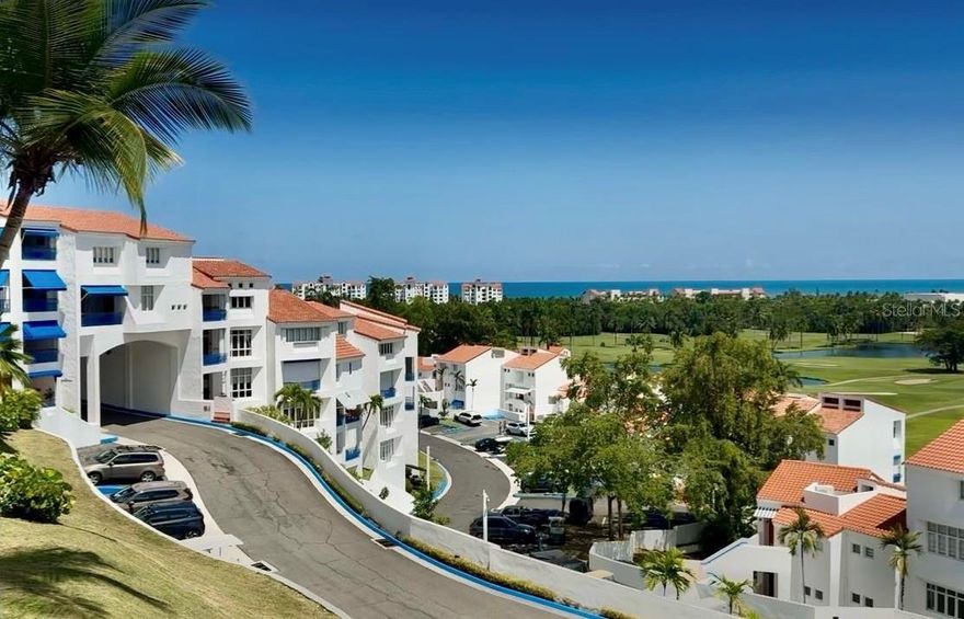 Fully furnished villa in the exclusive, double-gated Wyndham Rio Mar community—ideal for residents seeking a serene lifestyle. Enjoy panoramic golf, lakes and ocean views from your large private balcony. Features include a spacious kitchen, high ceilings, 4 A/C units, and full resort access: golf, tennis, beach, and trails. Just minutes from El Yunque Rainforest, beaches, dining, and shopping. 24/7 security. Strong rental and appreciation potential.