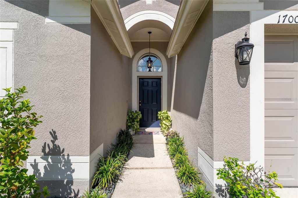 Photo of 1700 Leybourne Loop, Wesley Chapel, FL 33543 (MLS # TB8394789)