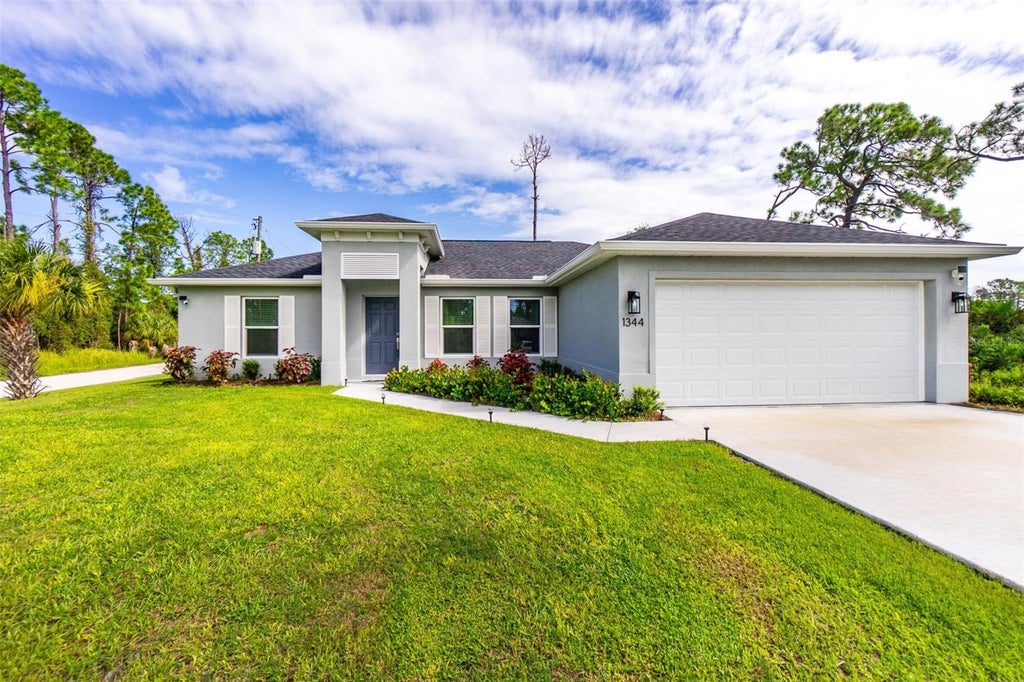 Photo of 1344 Heritage Avenue, North Port, FL 34288 (MLS # C7530851)
