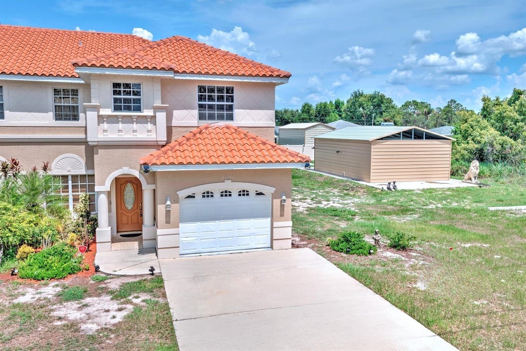 Photo of 4050 Placid Lakes Boulevard, Lake Placid, FL 33852 (MLS # L4963216)