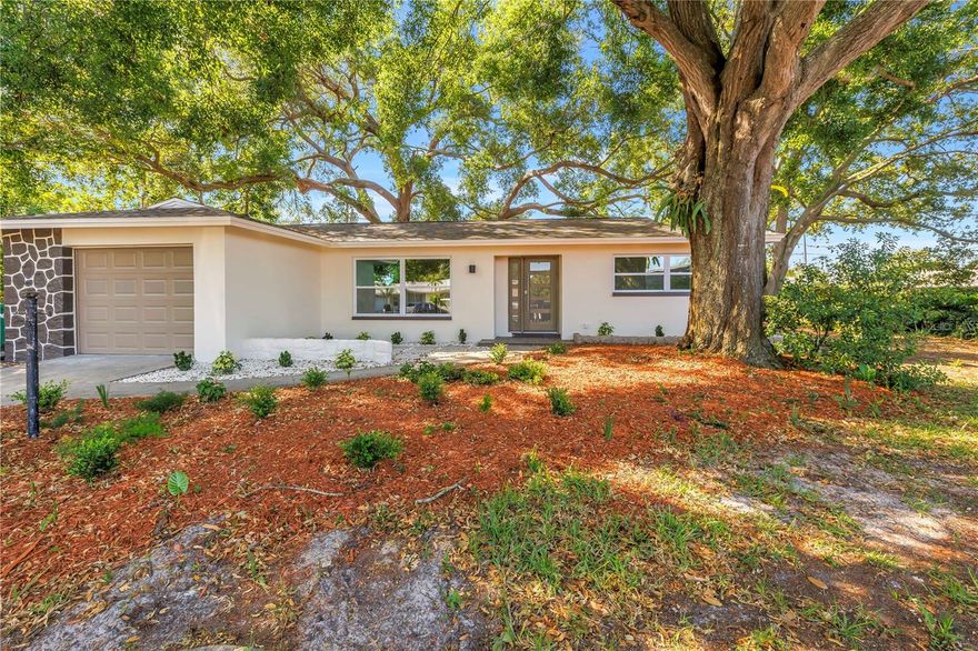 One or more photo(s) has been virtually staged. Completely renovated from top to bottom, this stunning spacious 3 bedroom 2 bath home offers modern living in a peaceful, family-friendly setting. Nestled on a quiet cul-de-sac in beautiful neighborhood, the property features mature landscaping that provides both beauty and privacy.
Step inside to discover a stunning mid century modern kitchen designed to impress, complete with elegant quartz countertops, updated cabinetry,  stainless steel appliances, and high-end finishes—perfect for both everyday living and entertaining. The home also boasts newly installed hurricane-impact windows, offering enhanced safety, energy efficiency, and peace of mind.
Every detail has been thoughtfully updated, creating a move-in-ready space with a fresh, contemporary feel throughout. Located in a great neighborhood known for its excellent schools, this home is ideal for families seeking comfort, style, and convenience.
Don’t miss this rare opportunity to own a fully renovated home in a prime location! Roof 2021 AC 2025 Water heater 2025