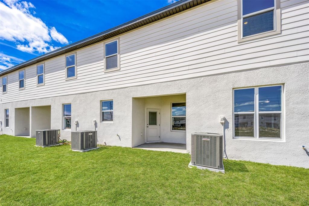 Photo of 703 Poppy Lane, Dundee, FL 33838 (MLS # TB8476361)